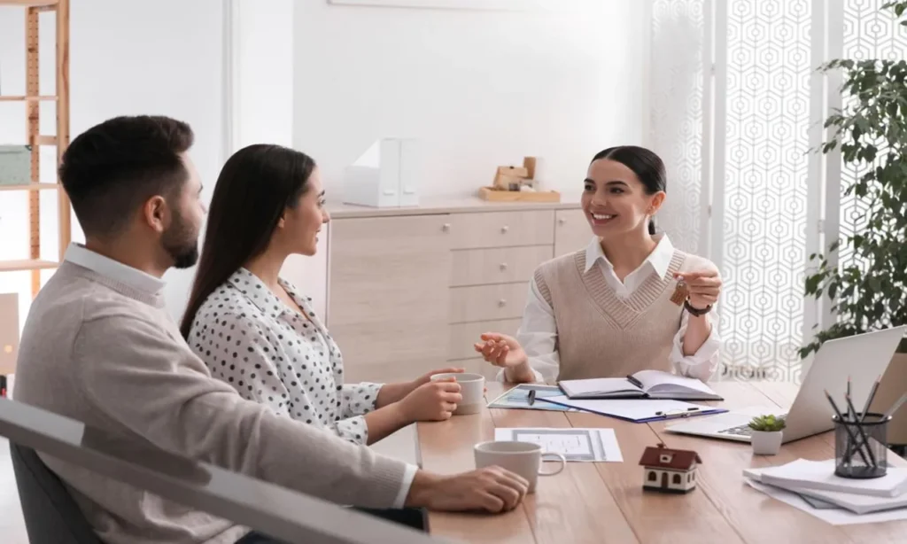 Home buying process help showing buyers working with a real estate agent while reviewing mortgage documents, inspecting homes, and completing a successful property purchase.