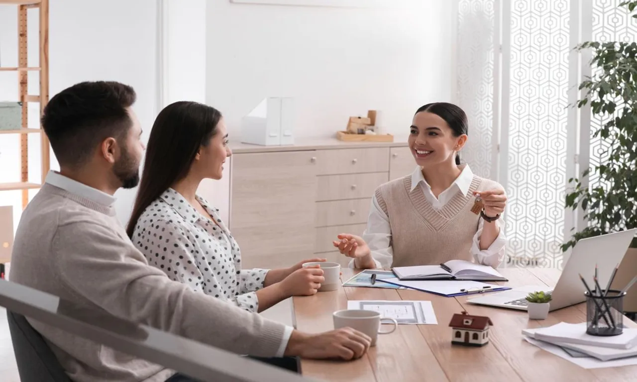 Home buying process help showing buyers working with a real estate agent while reviewing mortgage documents, inspecting homes, and completing a successful property purchase.